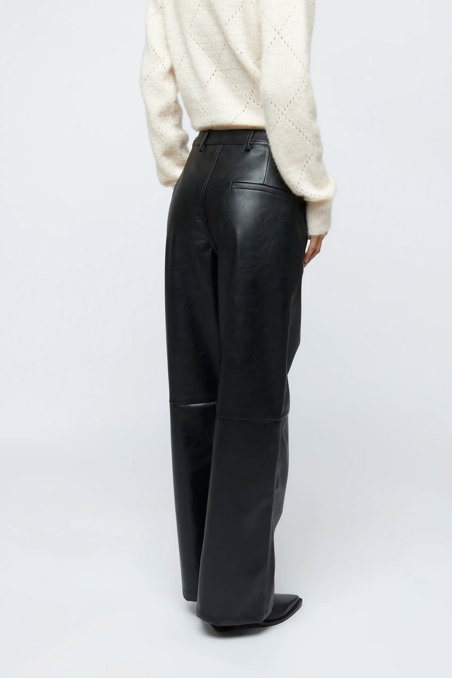 Black faux leather straight pants